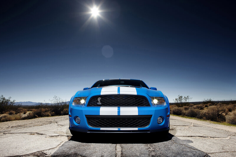 Blue Ford Mustang in desert