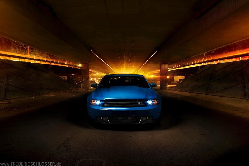 Blue Ford Mustang in tunnel