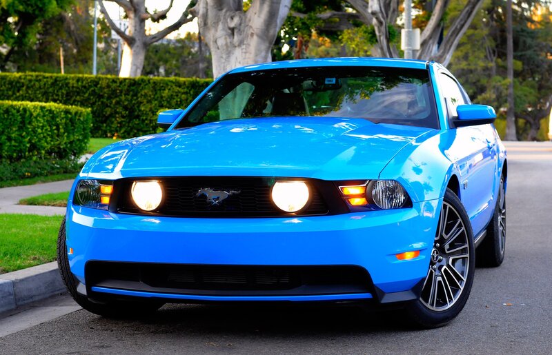 Blue Ford Mustang on a street