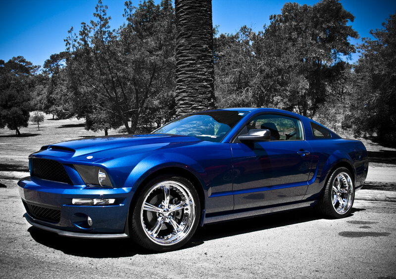 Blue Ford Mustang on a sunny day