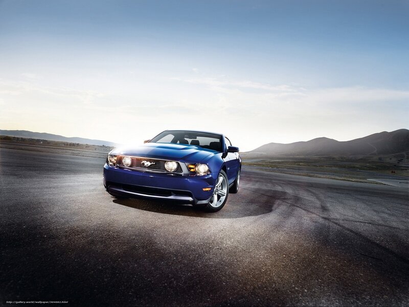 Blue Ford Mustang on a track