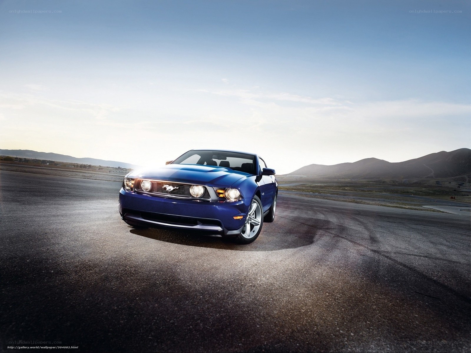 Blue Ford Mustang on a track