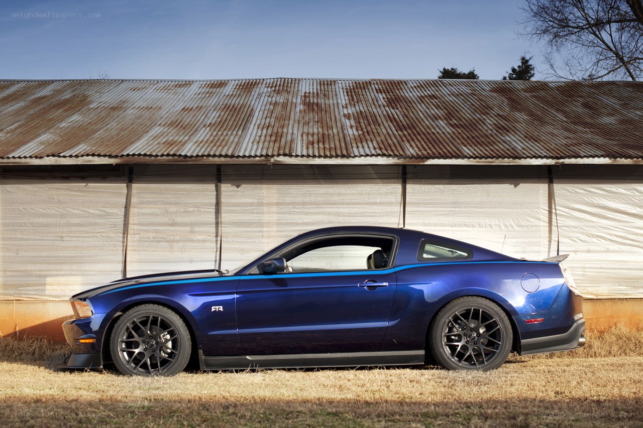 Blue Ford Mustang parked outside