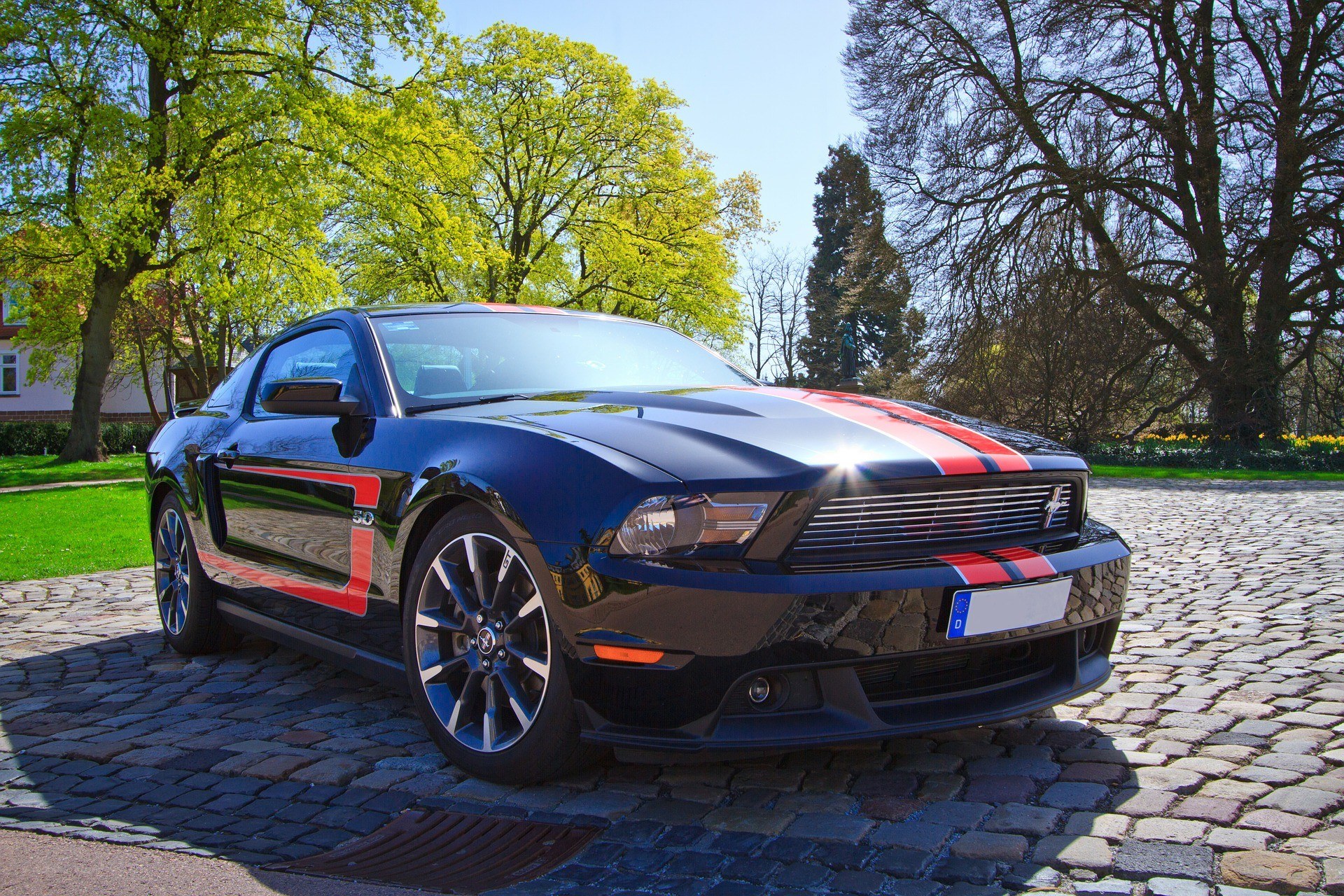 Blue Ford Mustang with stripes