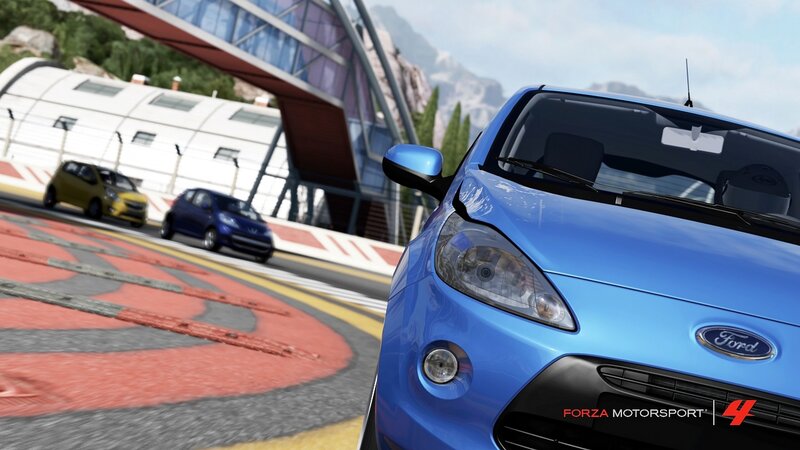 Blue Ford racing on track
