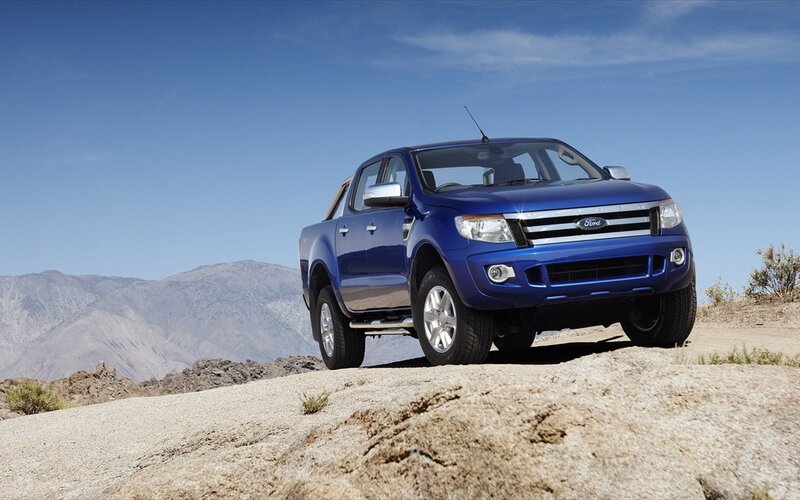 Blue Ford Ranger on rocky terrain
