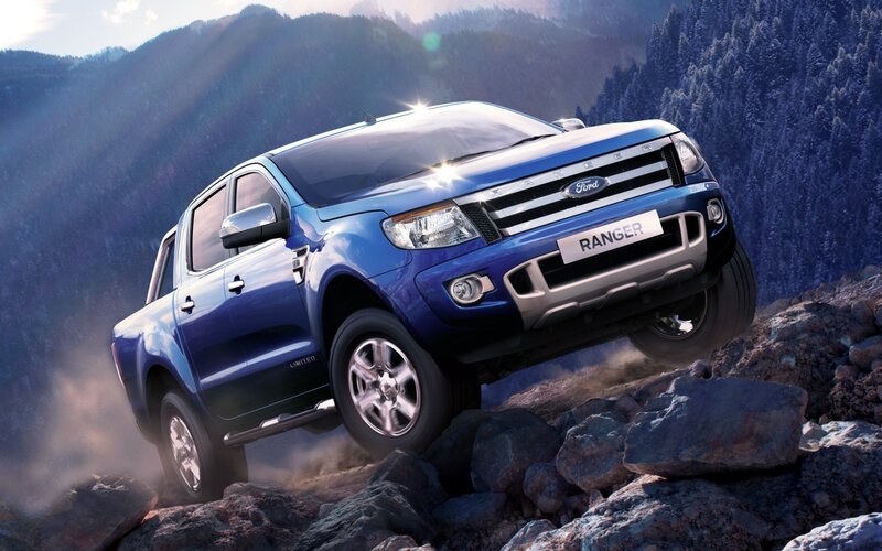 Blue Ford Ranger on rocky terrain