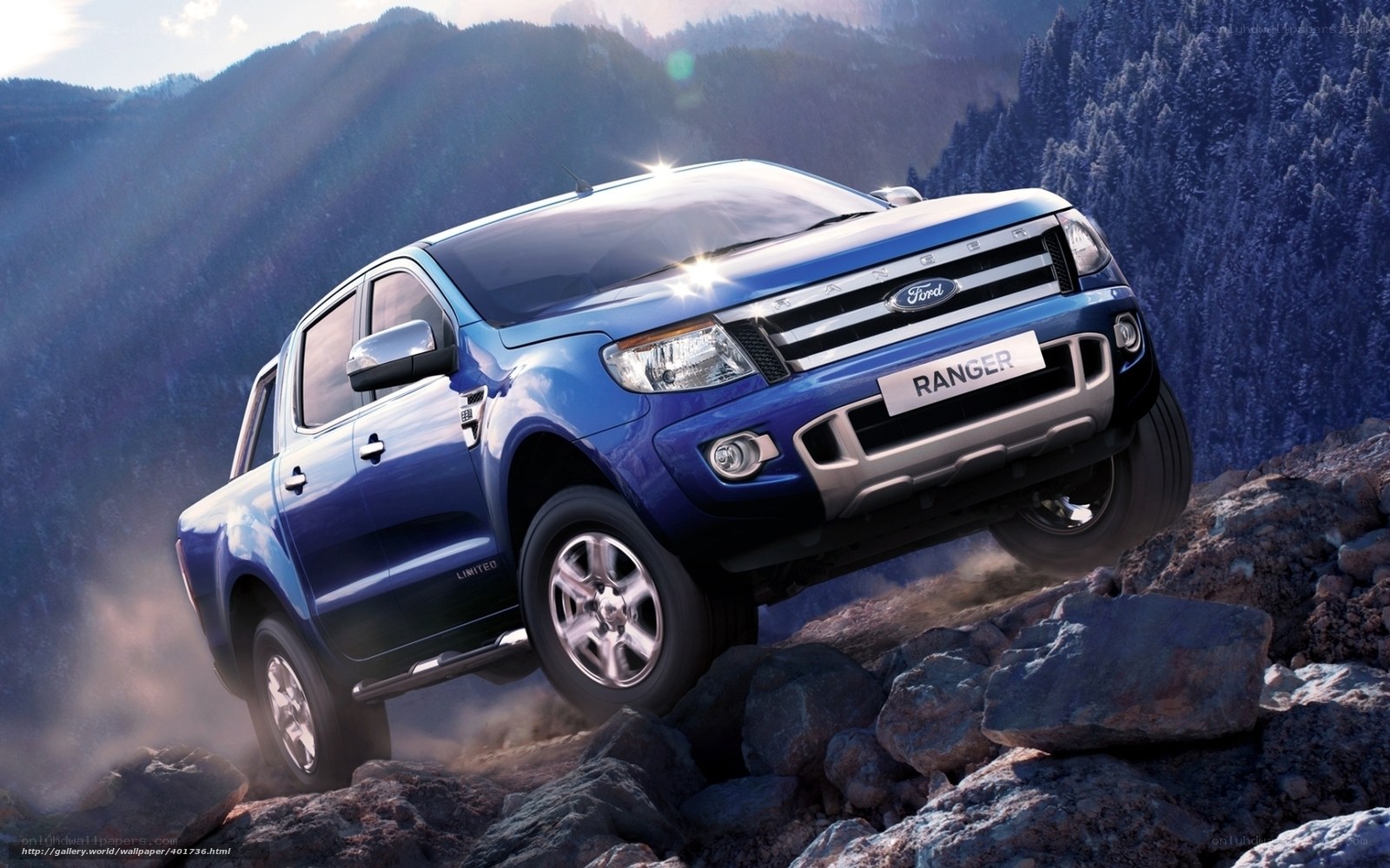 Blue Ford Ranger on rocky terrain
