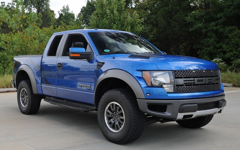 blue ford raptor pickup truck