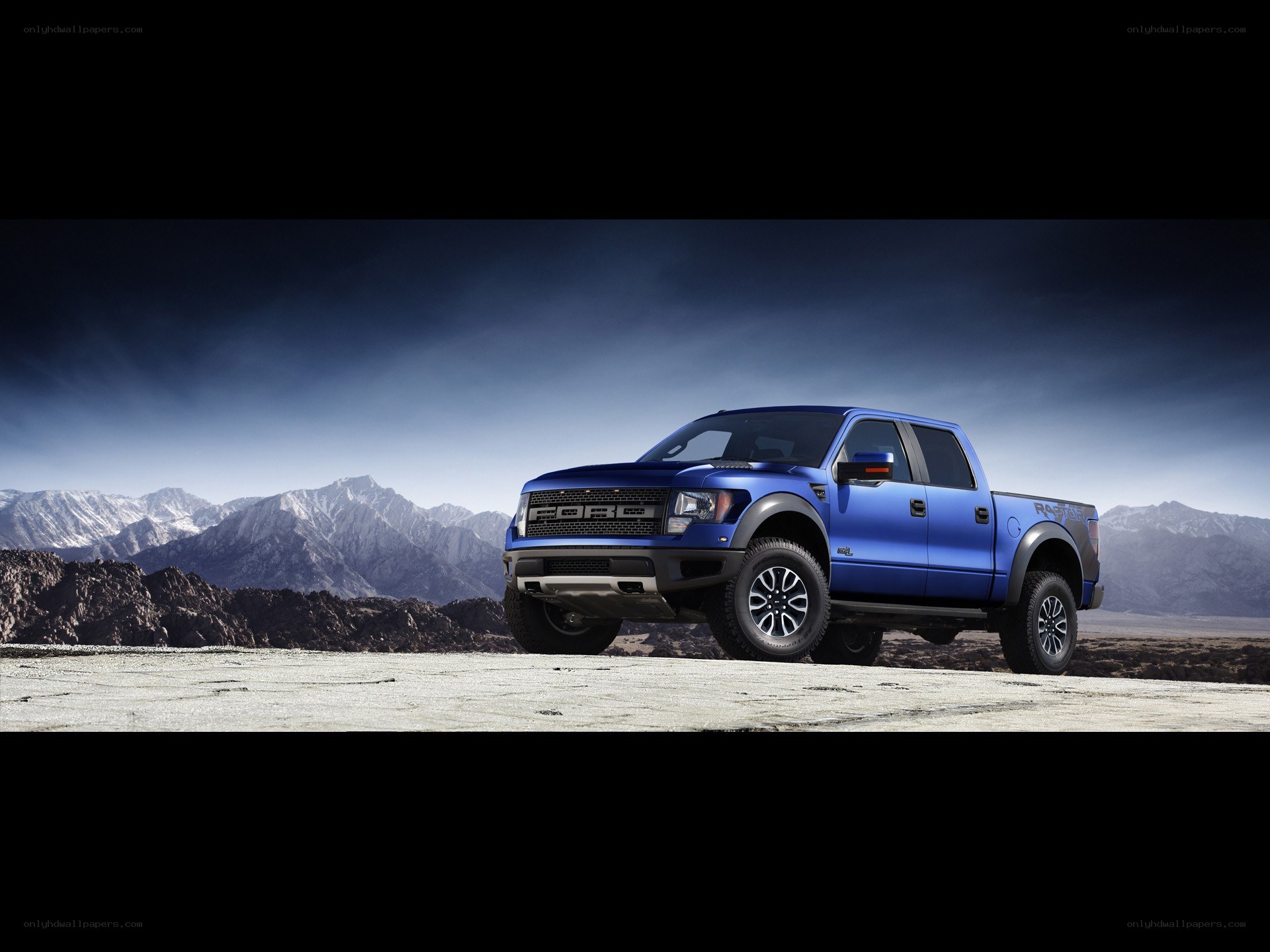 Blue Ford Raptor truck
