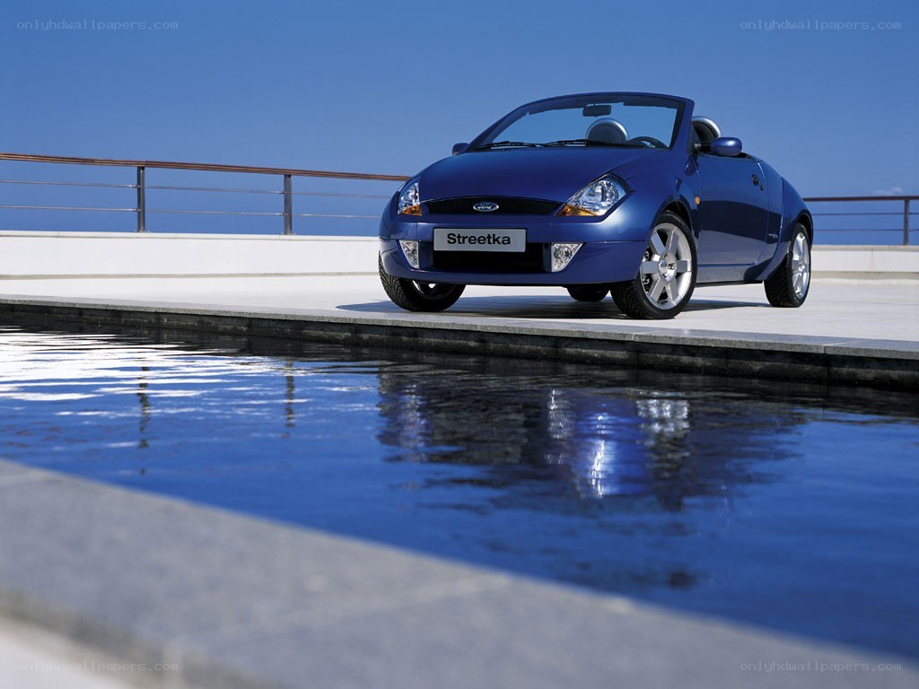 Blue Ford Streetka by pool