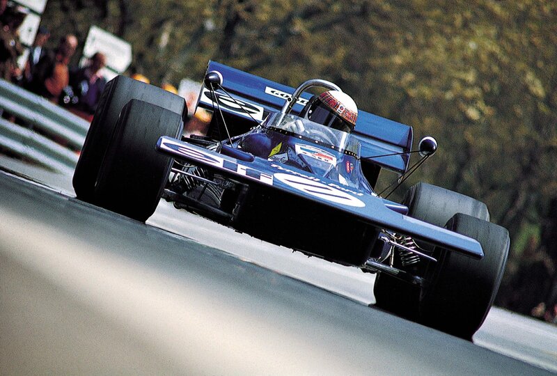 Blue Formula One Car — Dynamic, Afternoon, Photograph, Driver, Race Track, Spectators