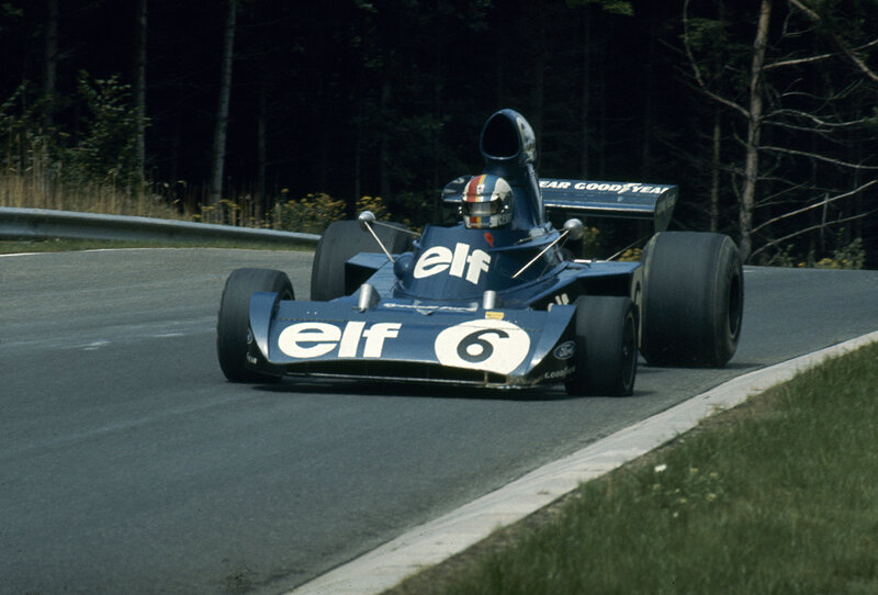 Blue Formula One Car — Dynamic, Afternoon, Photograph, Driver, Race Track, Trees