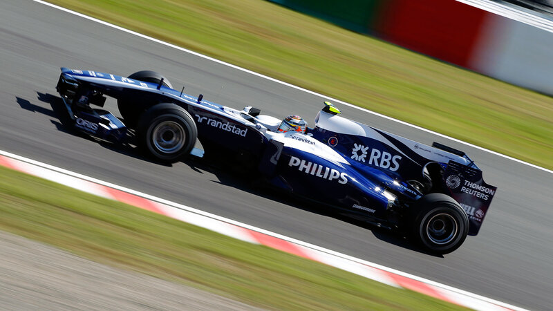 Blue Formula One Car — Dynamic, Afternoon, Photograph, Driver, Racetrack, Grass