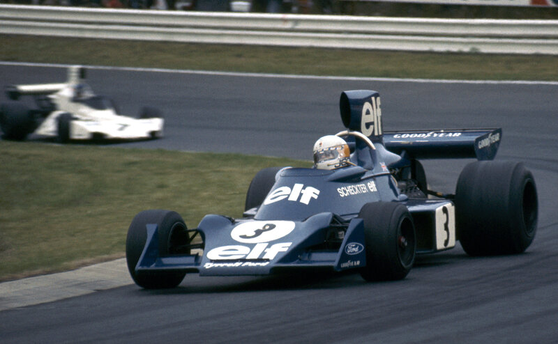 Blue Formula One Car — Dynamic, Afternoon, Photograph, Racing Driver