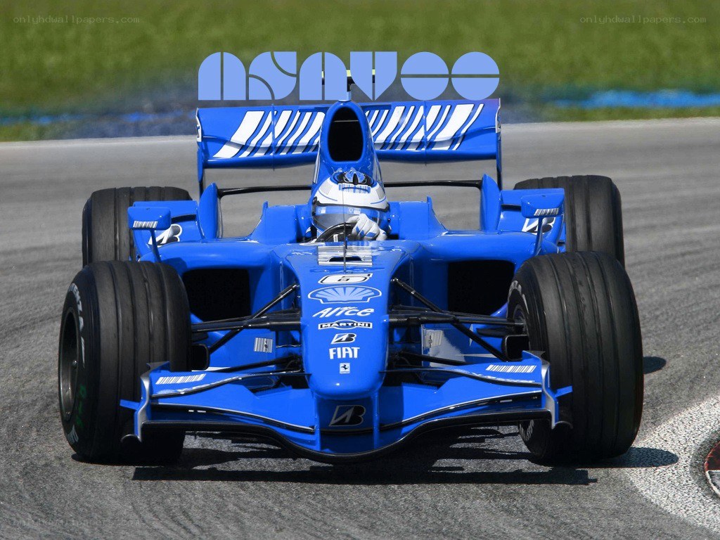 blue formula one car on track