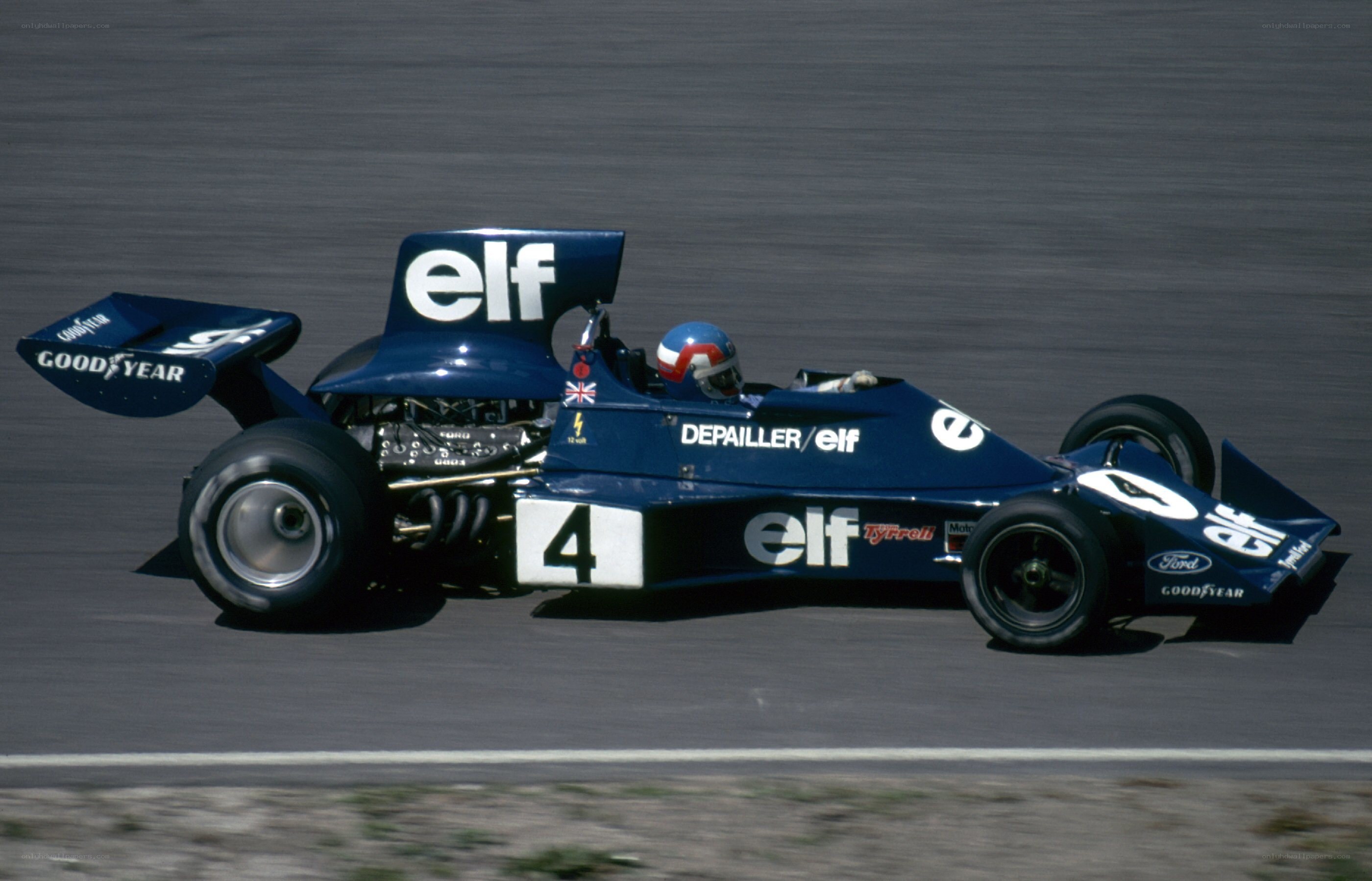 Blue Formula One car racing