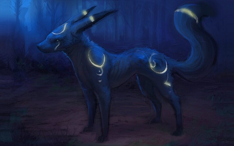 blue fox in a dark forest