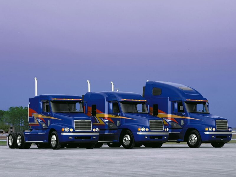 Blue Freight Trucks in a Row