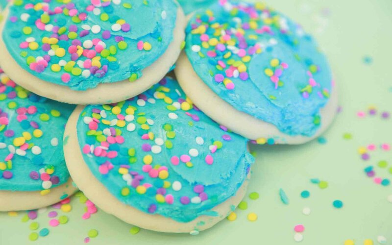 blue frosted cookies with sprinkles