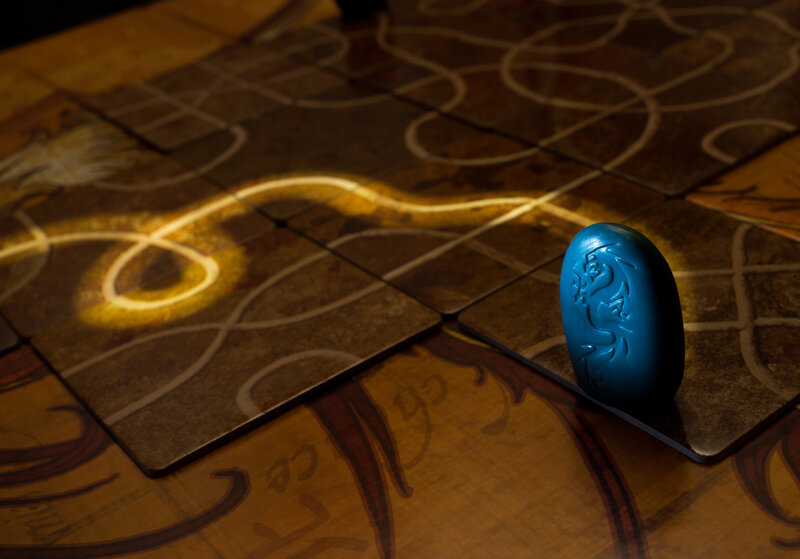 Blue Game Token on Board