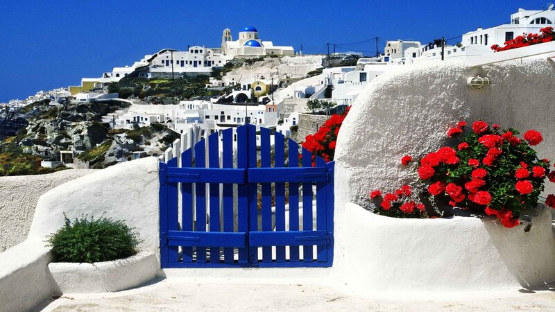 Blue gate in Santorini village