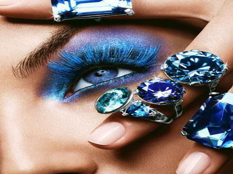 Blue gemstone jewelry and makeup