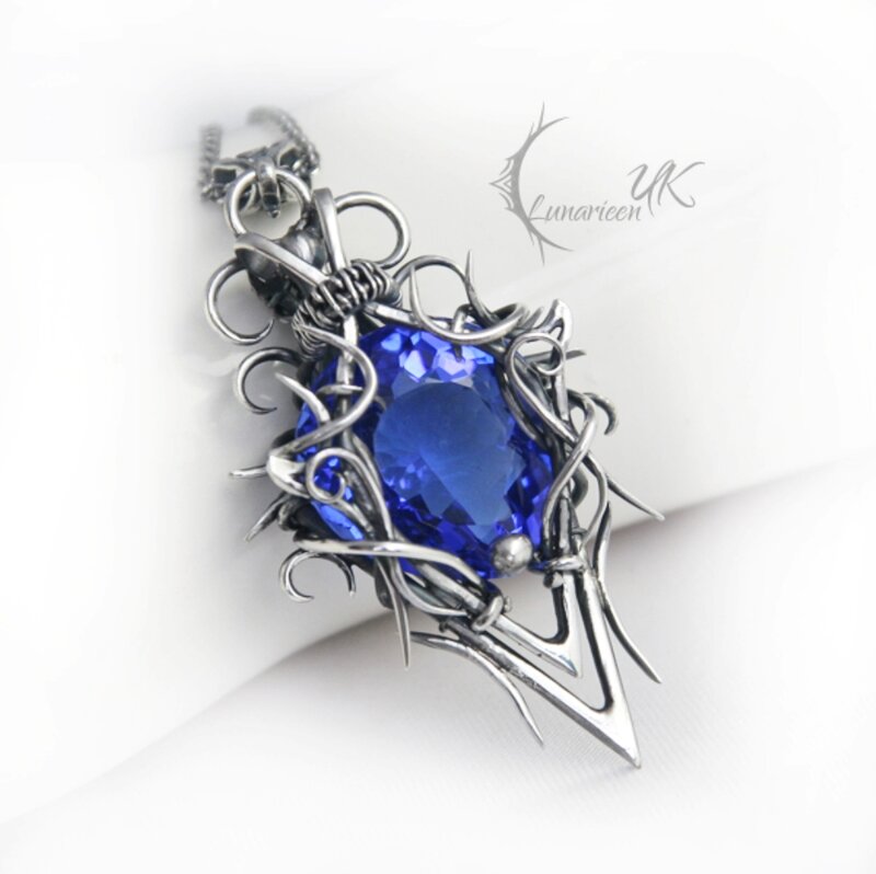 Blue Gemstone Pendant — Dramatic