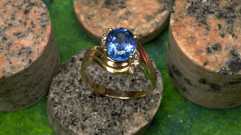Blue gemstone ring on stone