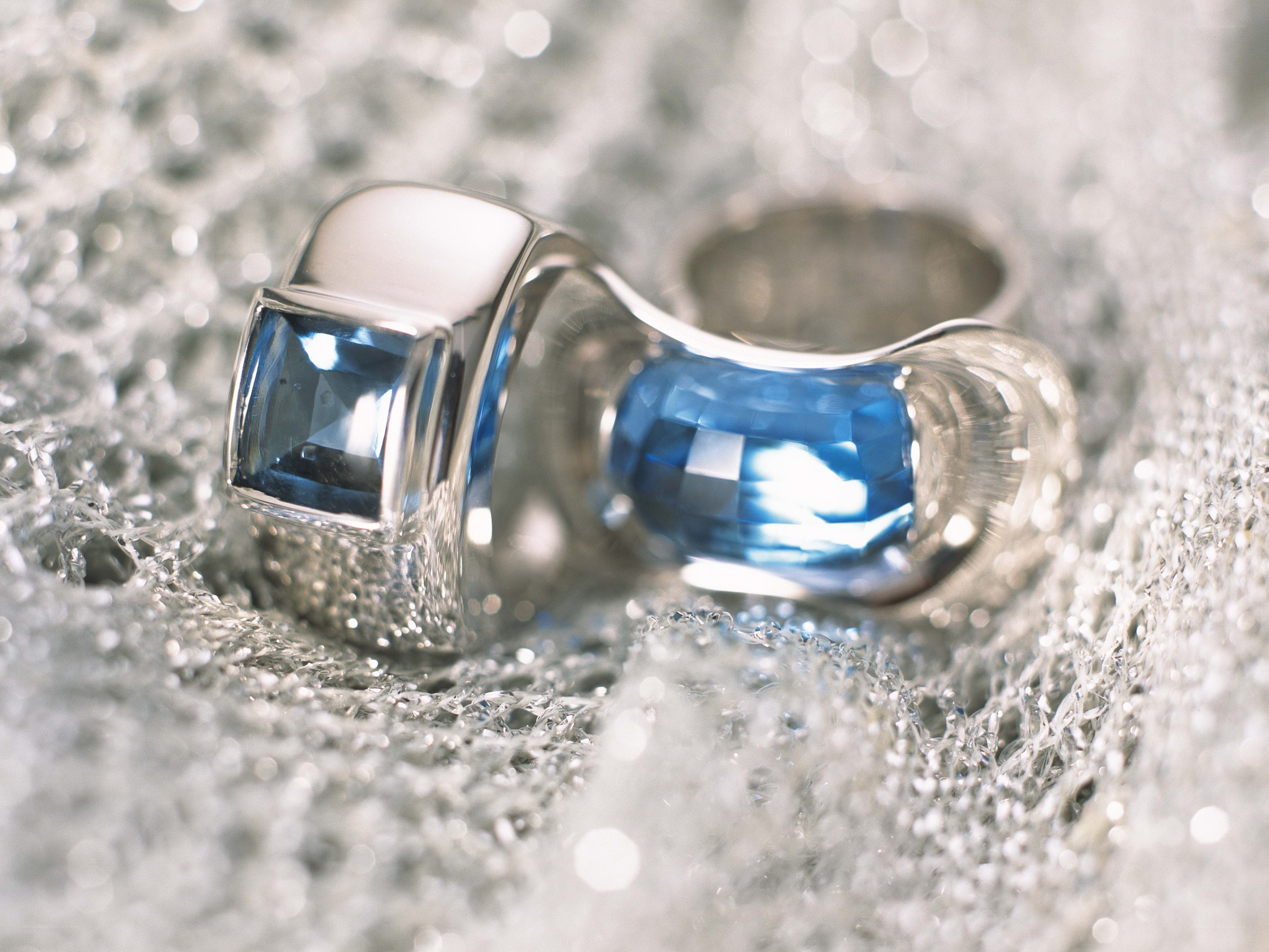 Blue gemstone rings on fabric