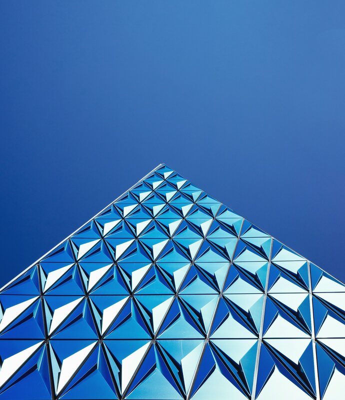 Blue Geometric Building — Dramatic