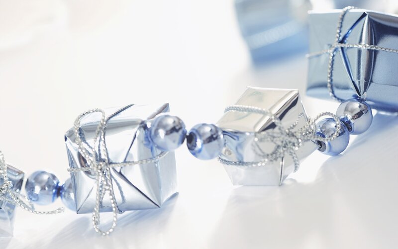 Blue gift boxes with beads