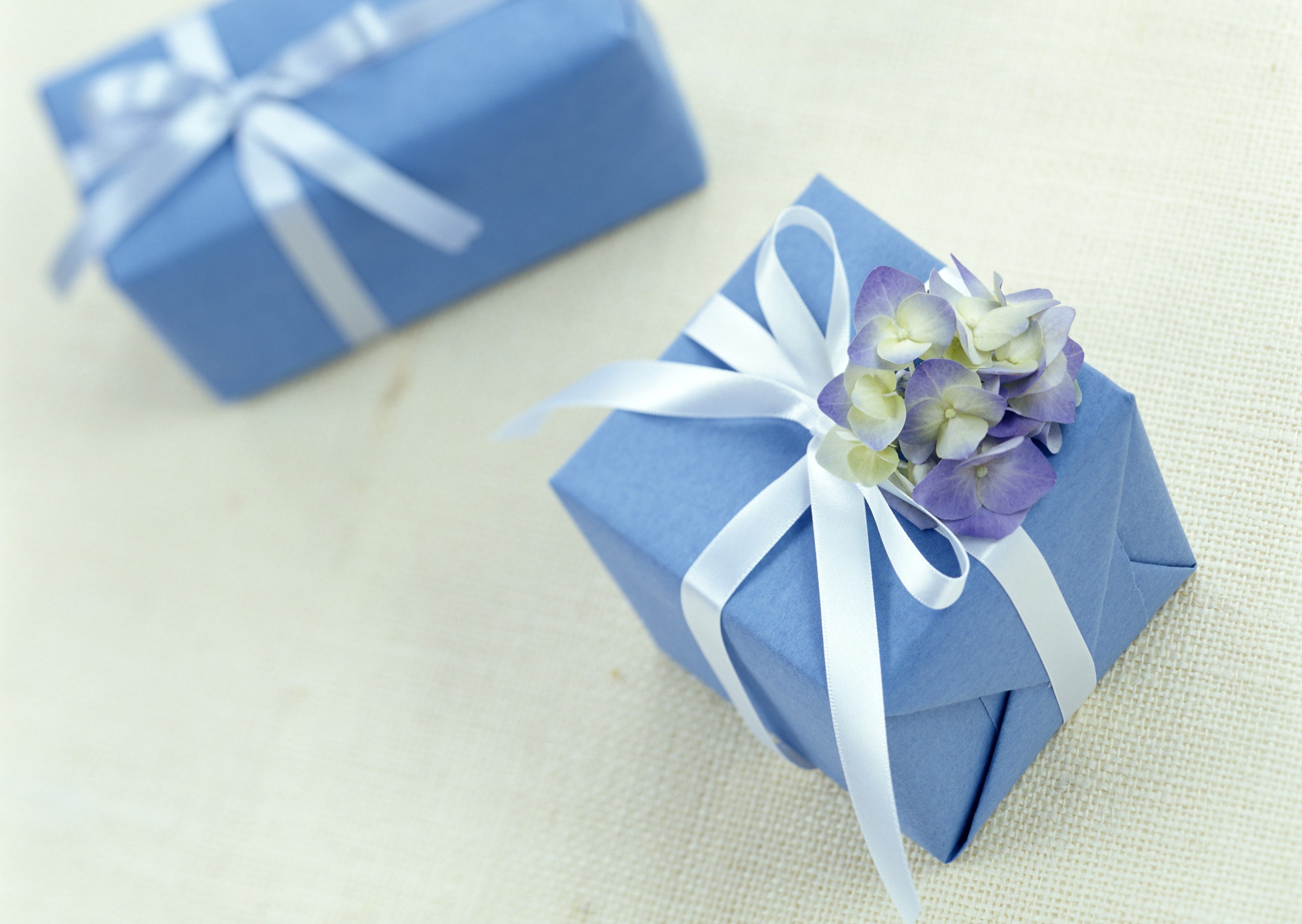 Blue gift boxes with flowers