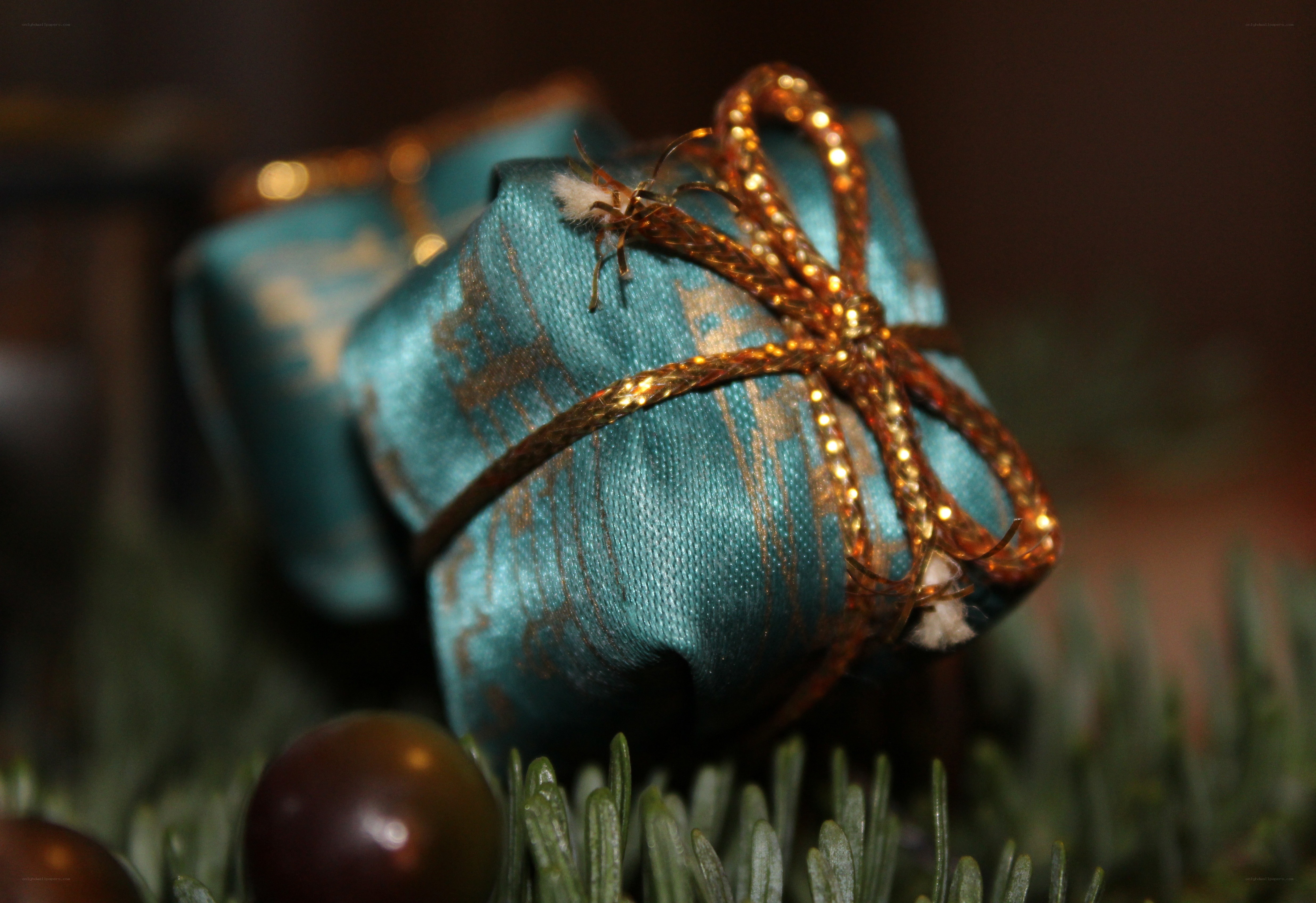 Blue gift with golden ribbon