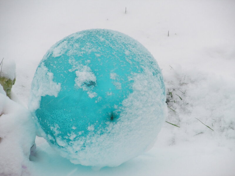 Blue Glass Ball in Snow