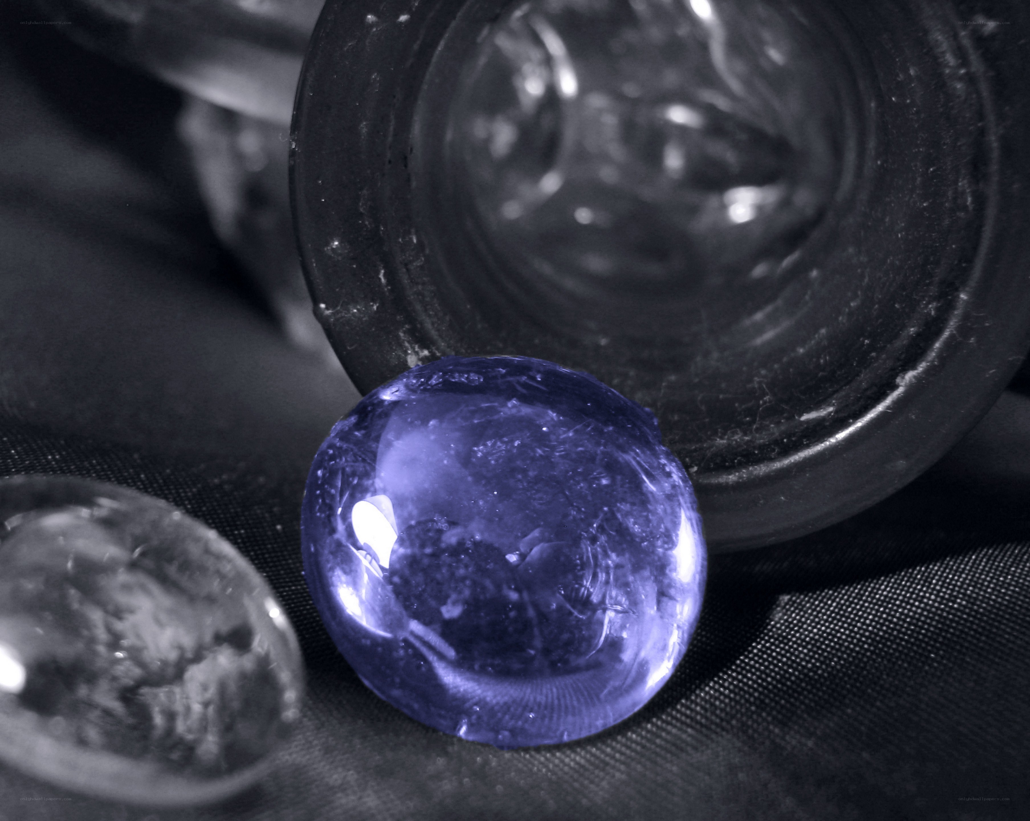 blue glass beads on fabric