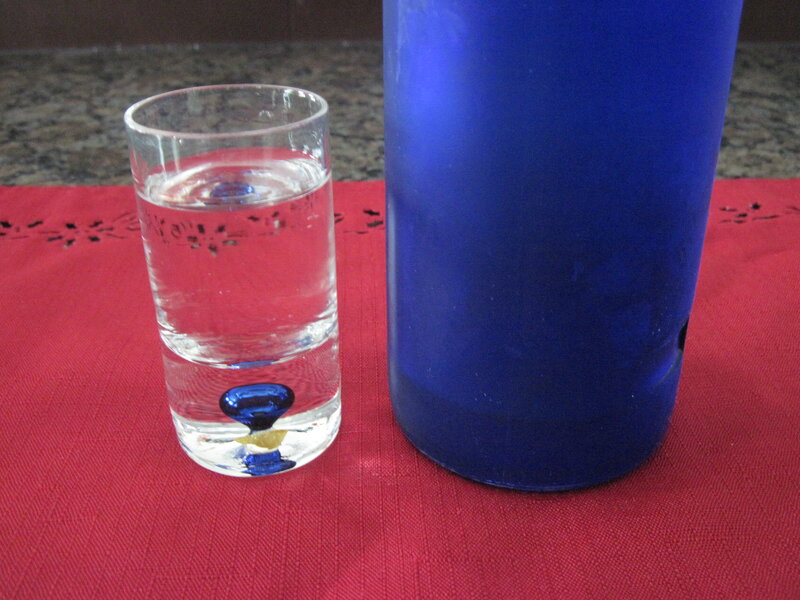 Blue Glass Bottle and Shot Glass