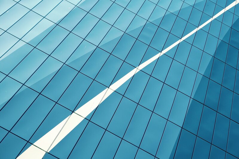 Blue Glass Building Facade — Geometric