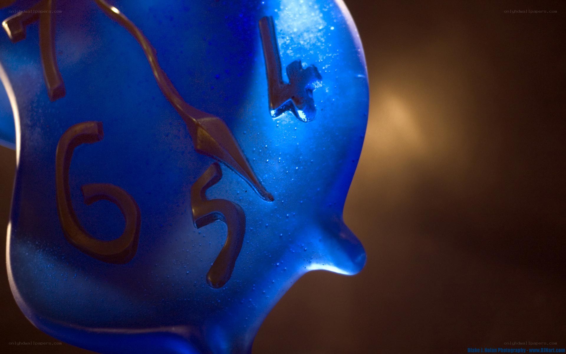 blue glass clock sculpture