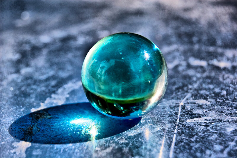 Blue Glass Marble — Dramatic