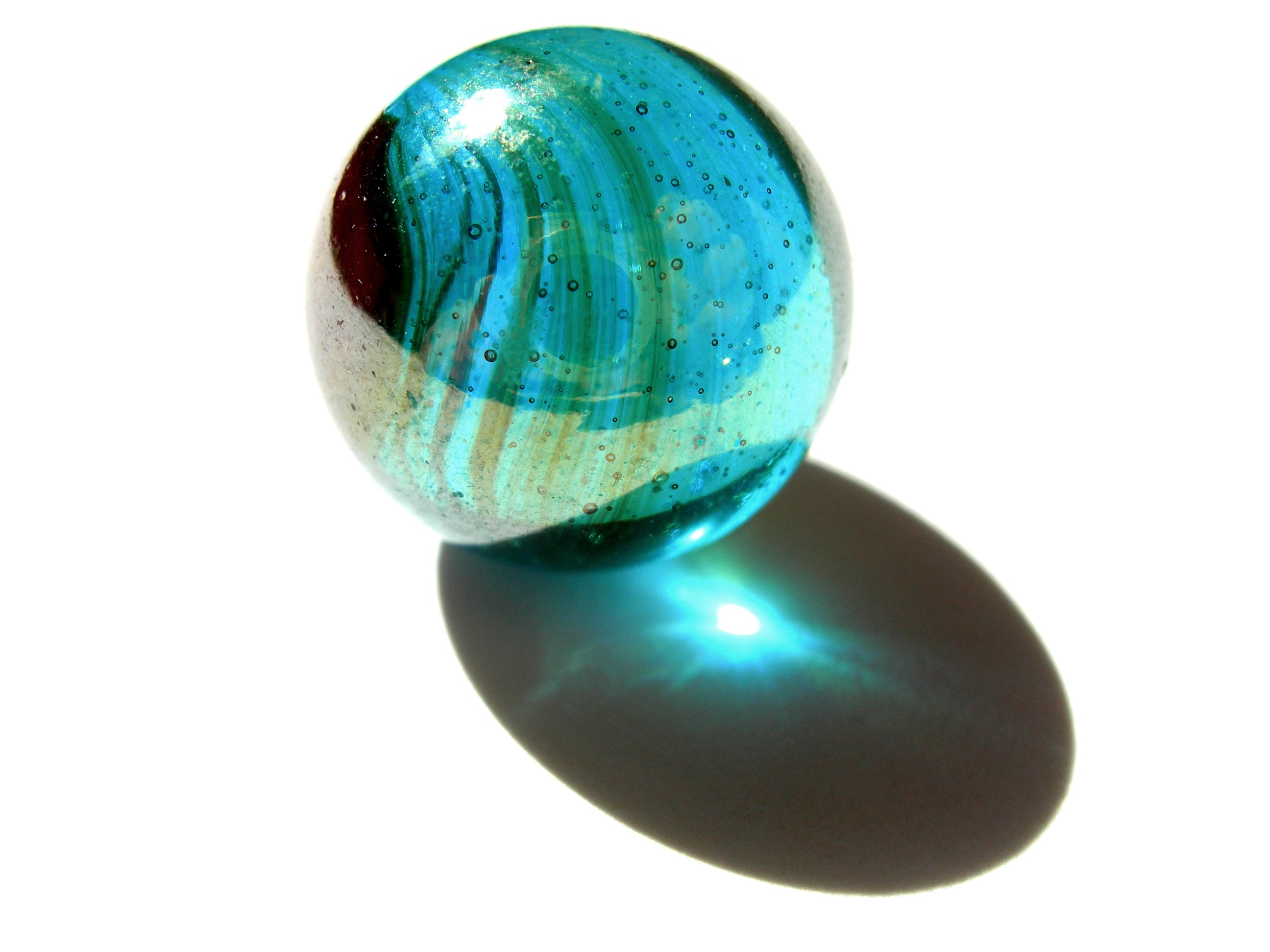 Blue glass marble with swirls