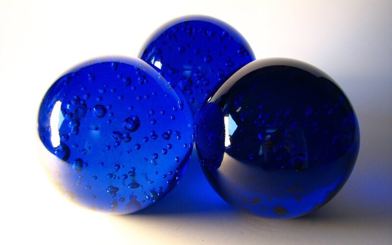 Blue glass marbles with bubbles