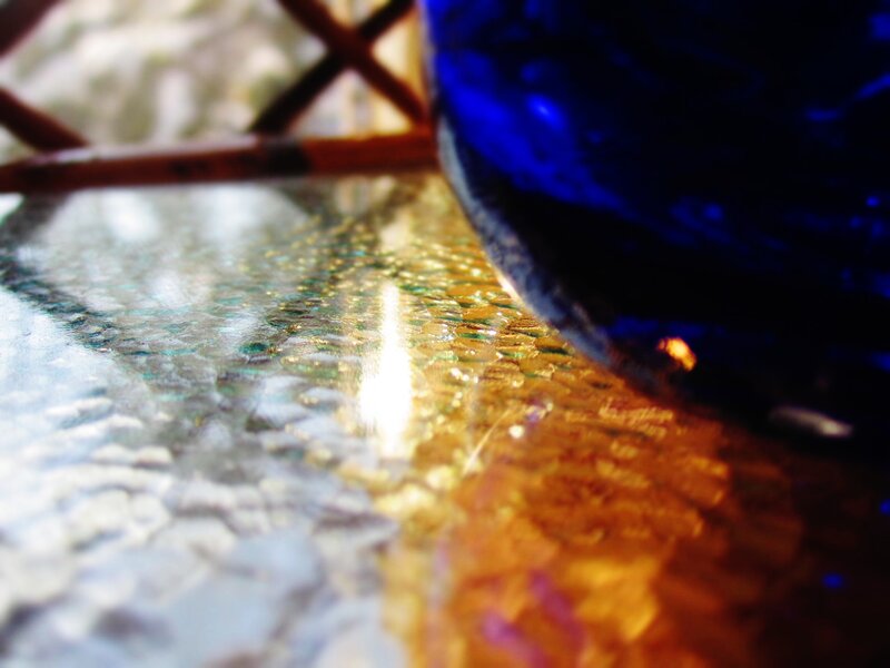 Blue Glass on Textured Surface