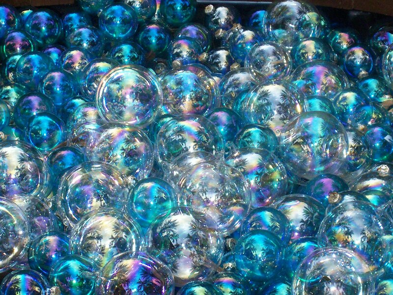 Blue glass ornaments with palm trees