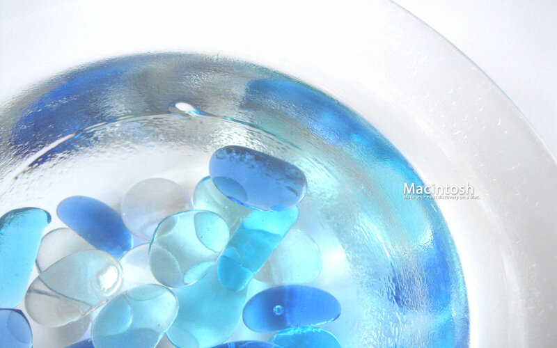 blue glass pebbles in bowl