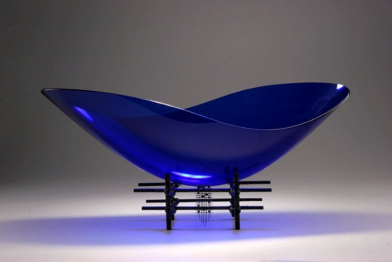 Blue glass sculpture on stand