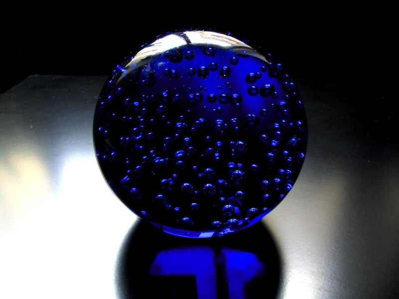 Blue glass sphere with bubbles