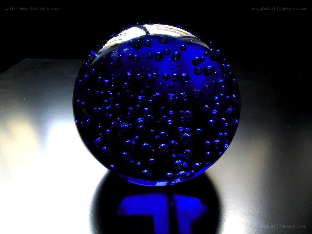 Blue glass sphere with bubbles
