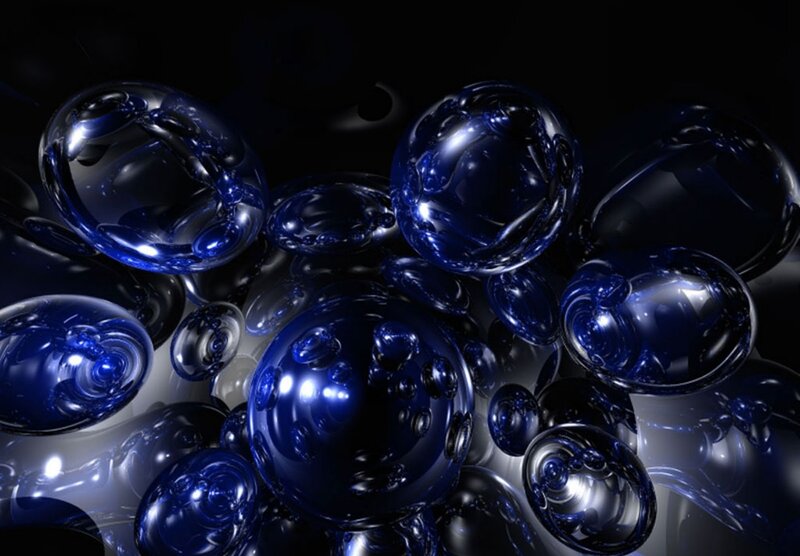 Blue glass spheres on dark background