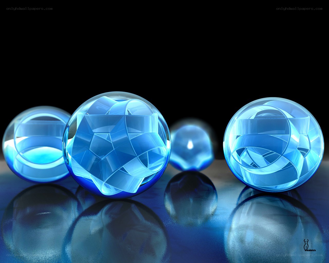 Blue glass spheres on reflective surface